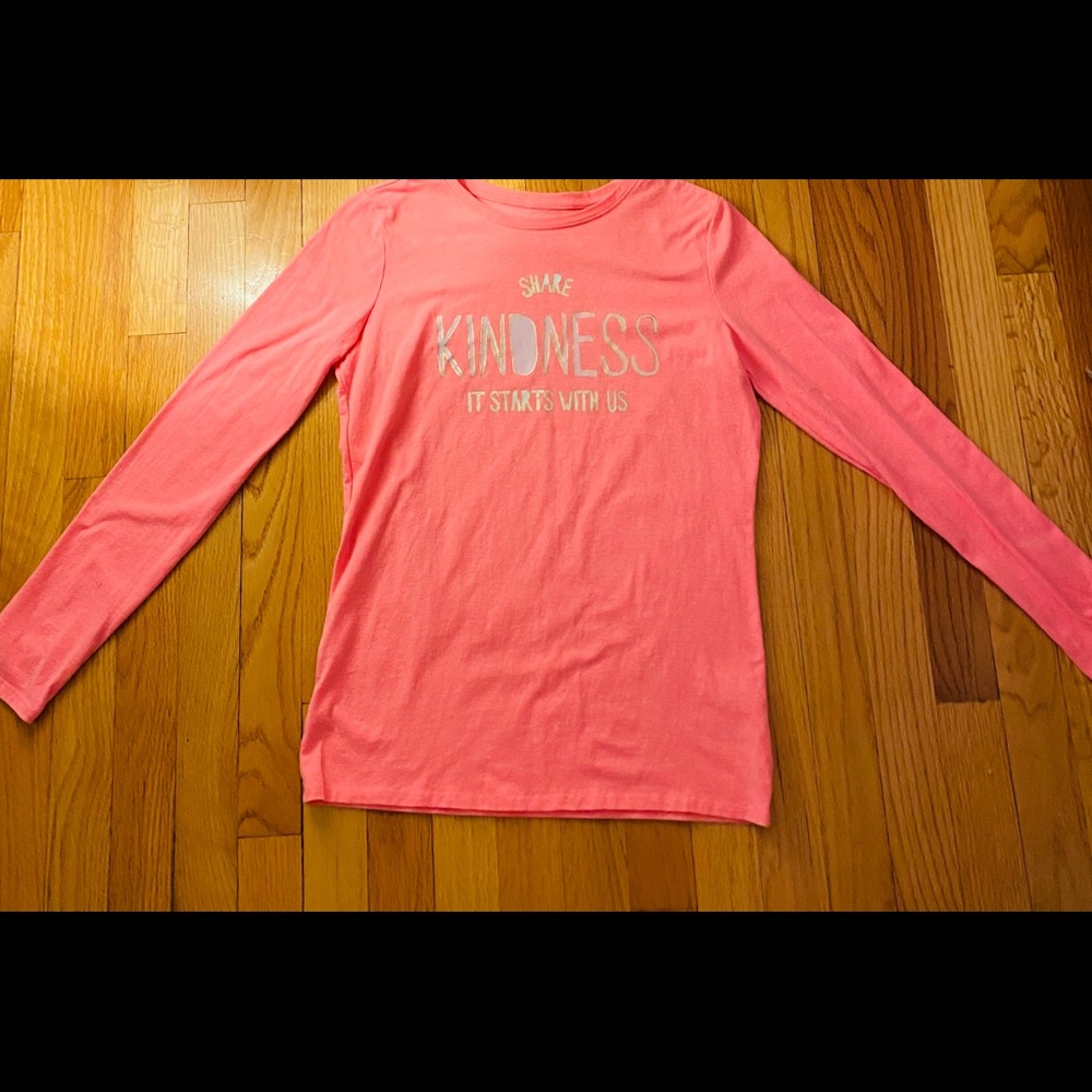 A pink ish Orange tee